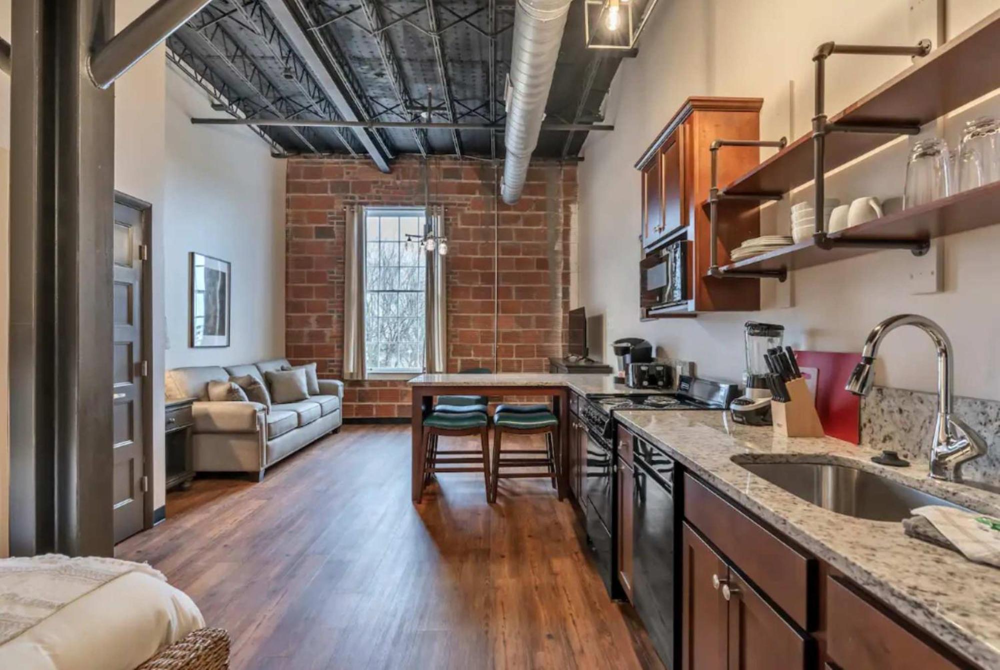 Industrial Luxe Above Grand Brewery Apartment