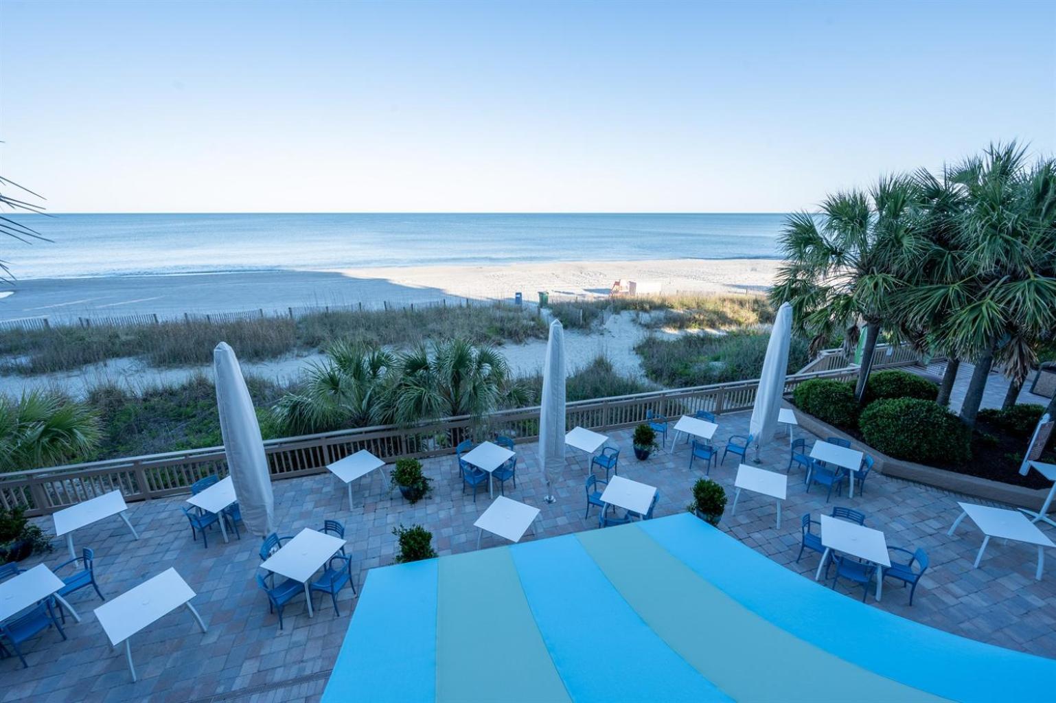 Holiday home Oceanfront 1br With Heated Pools, Coral *