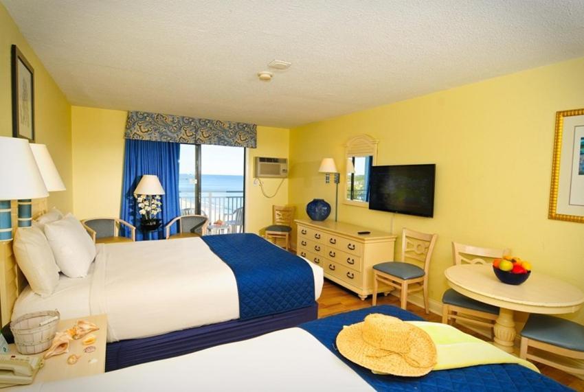Driftwood And Tides By Sea Mist Aparthotel